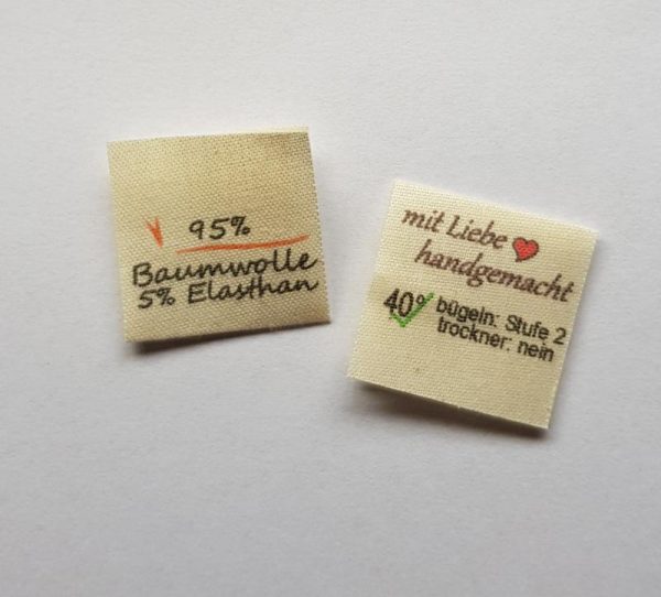 Naturbaumwoll Label, Aufdruck 95% Baumwolle, 5% Elasthan mittig gefalten